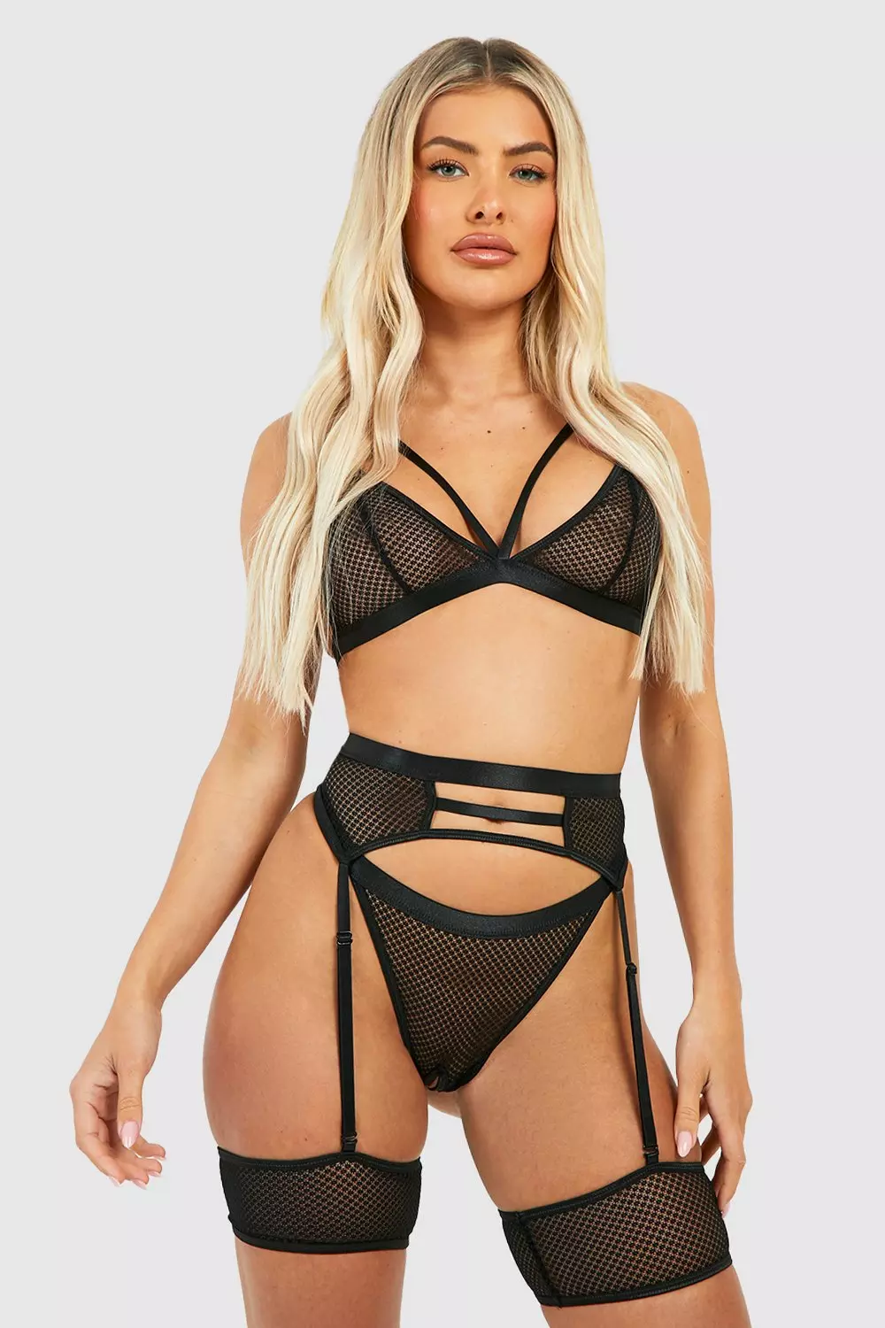 Black Crotchless Mesh Strappy Bralette Thong And Suspender Set alternative image