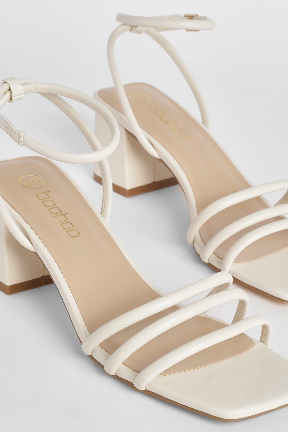 White block store low heel sandals