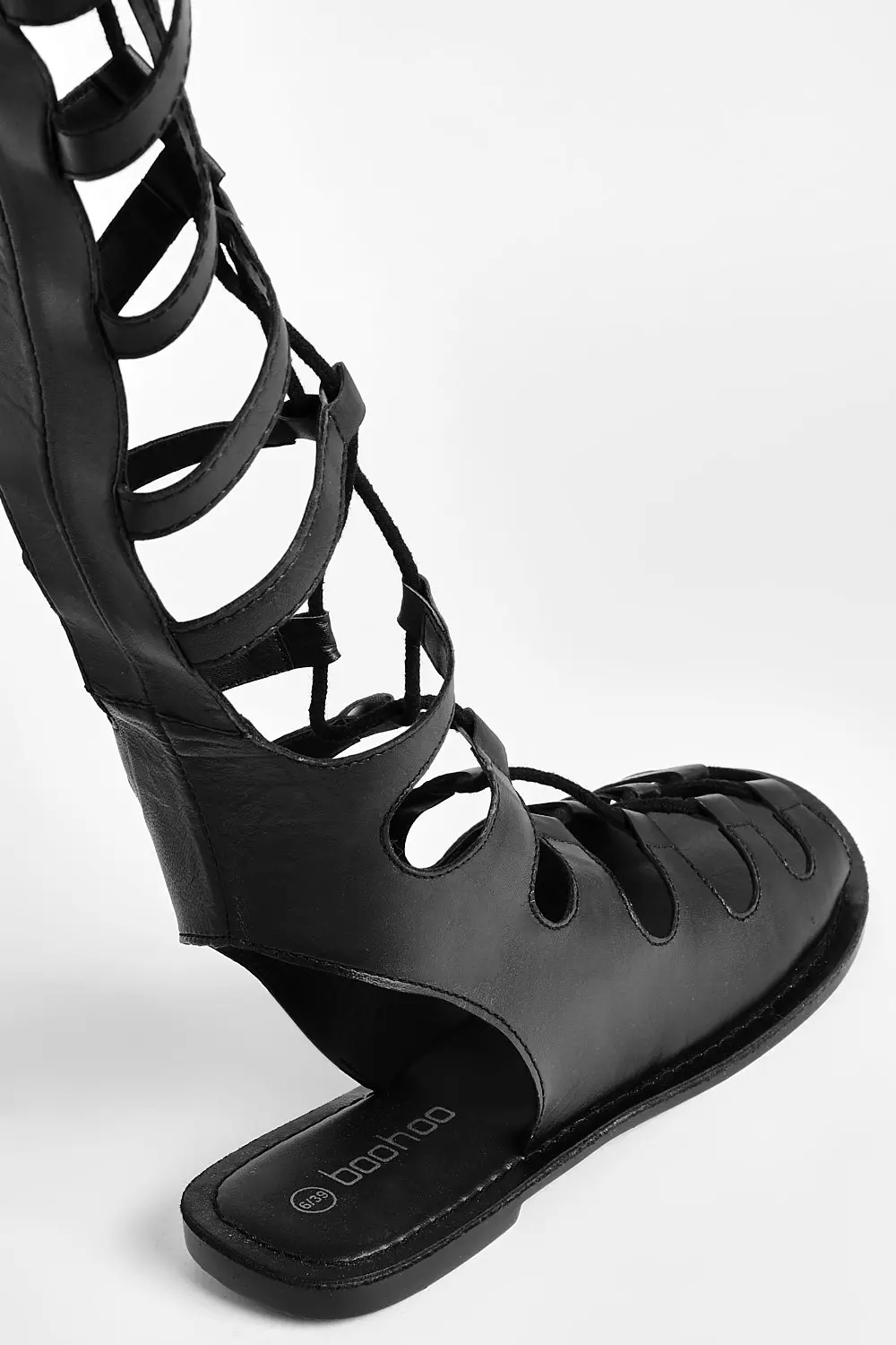 Gladiator sandals best sale black knee high