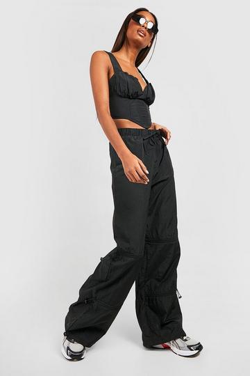 Multi Toggle Parachute Pants black