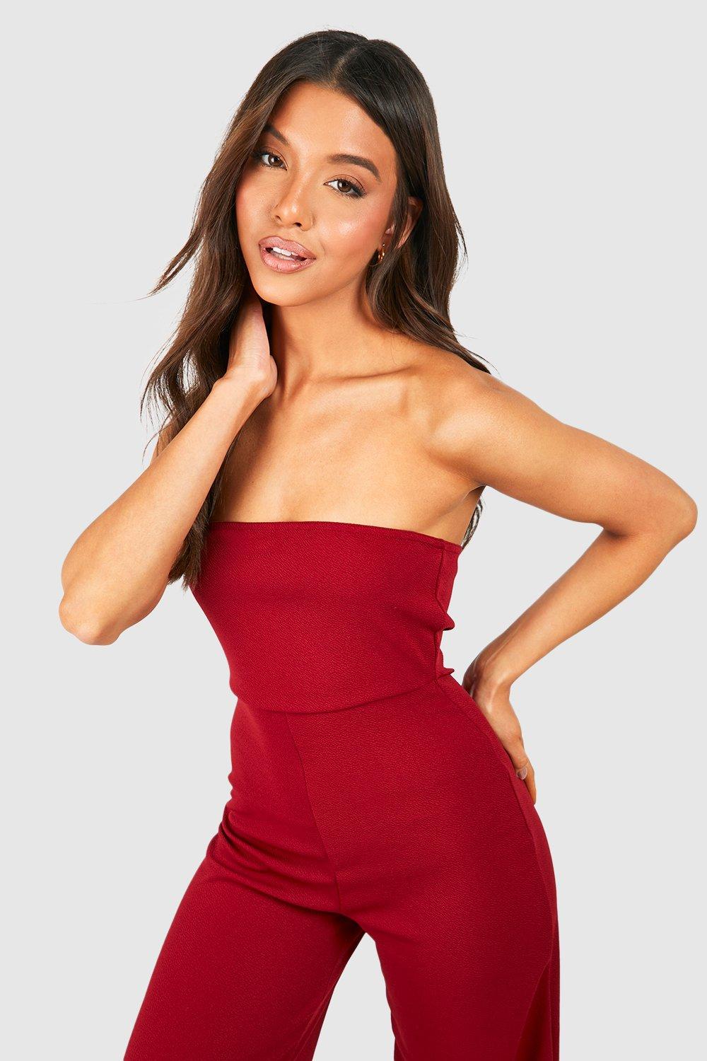 Red ruffles will turn heads in a bandeau jumpsuit.