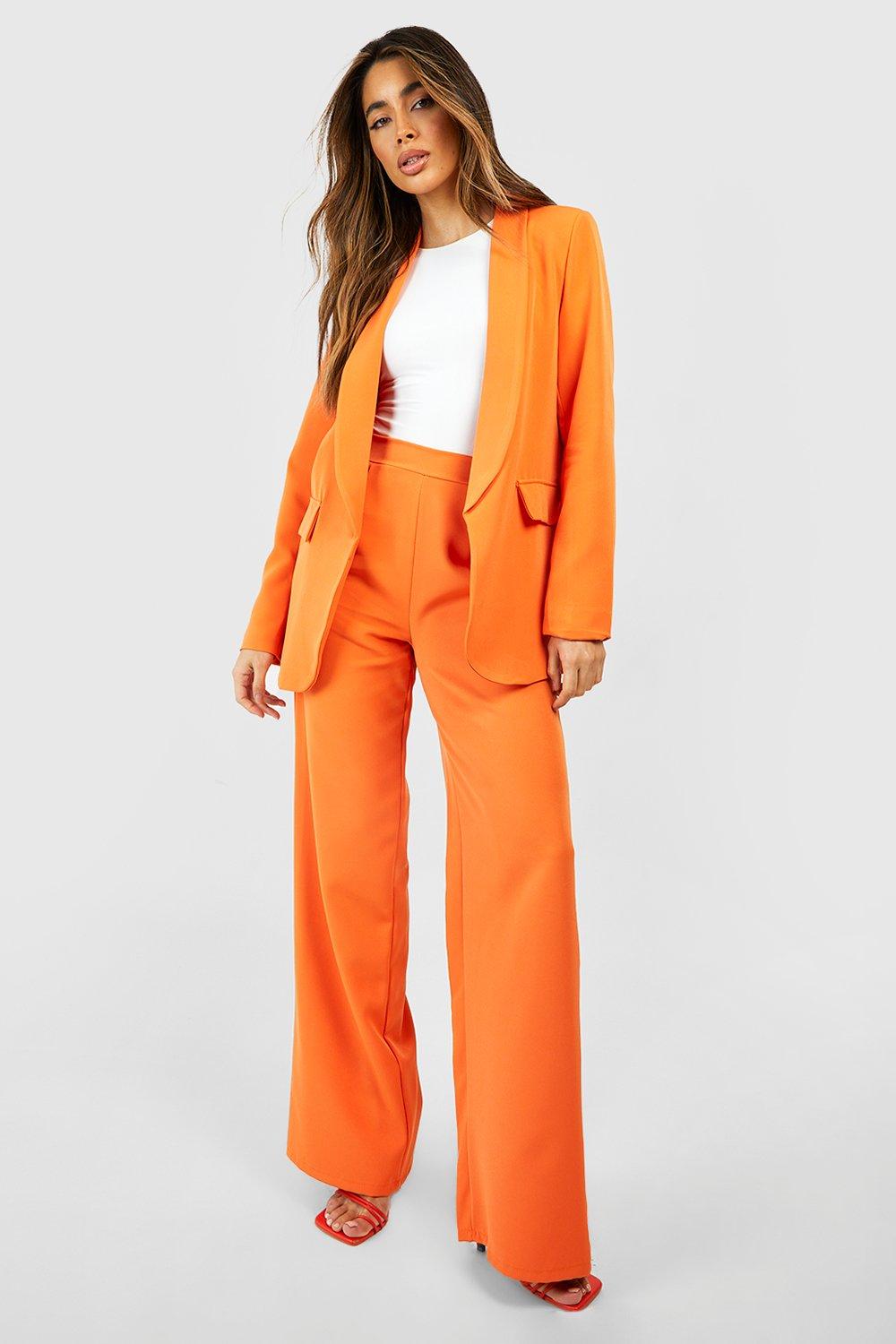 ASOS DESIGN relaxed wide leg flare pants in orange