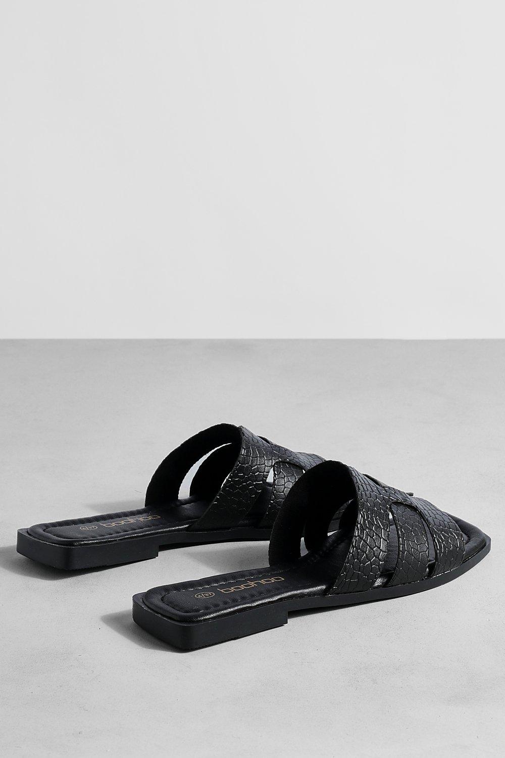 Black caged sandals online flat