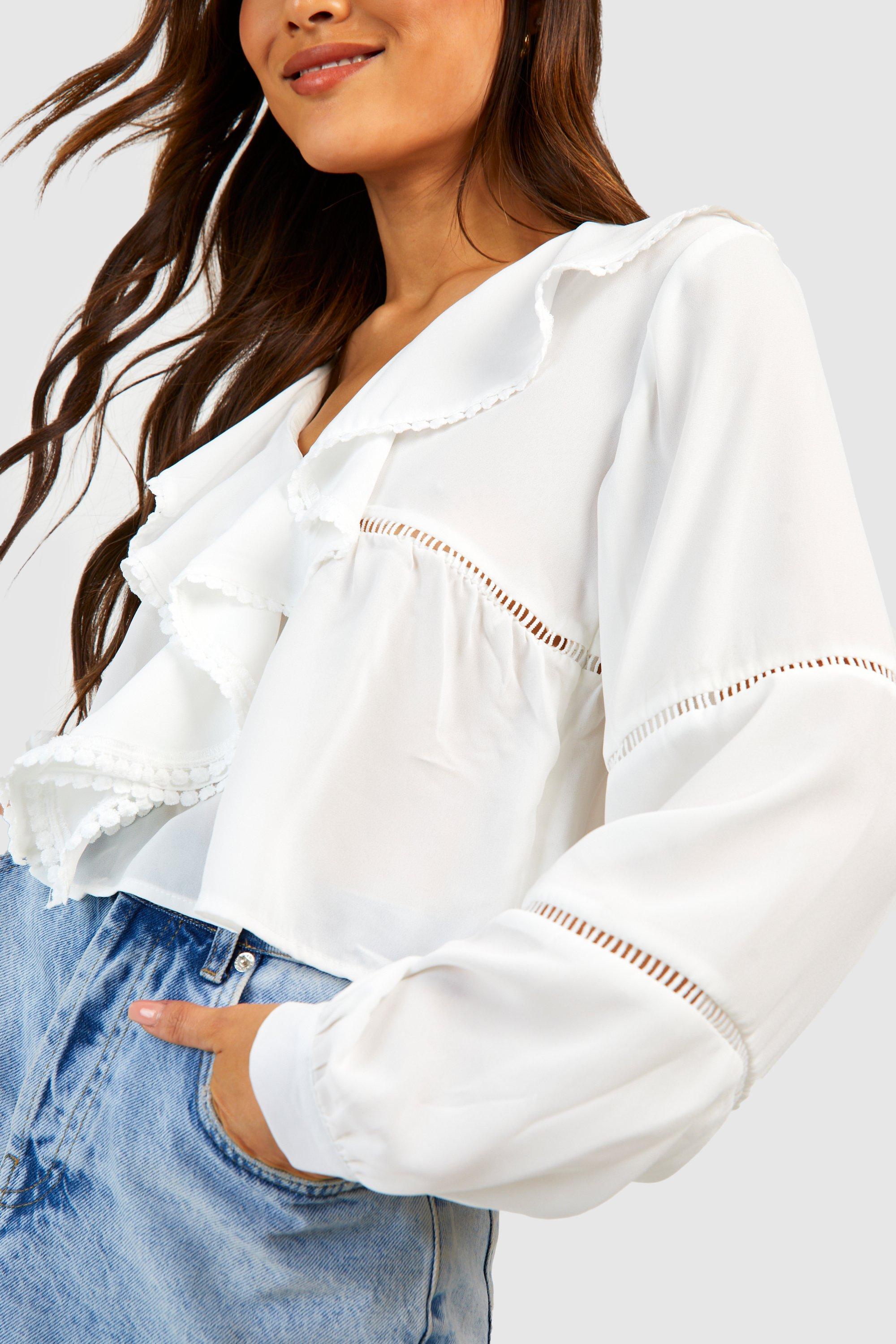 white ruffle v neck blouse