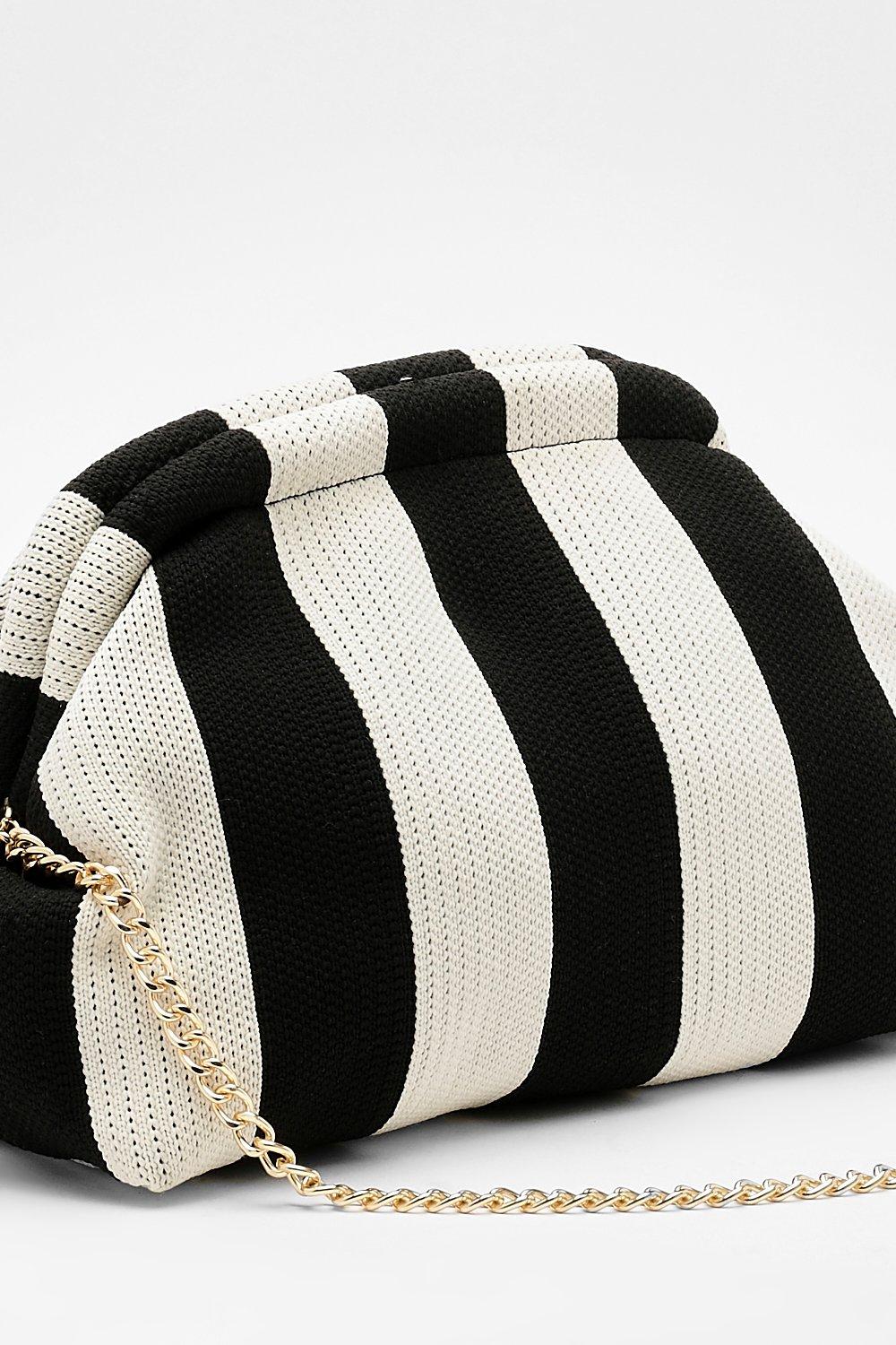 Black and white store striped clutch bag