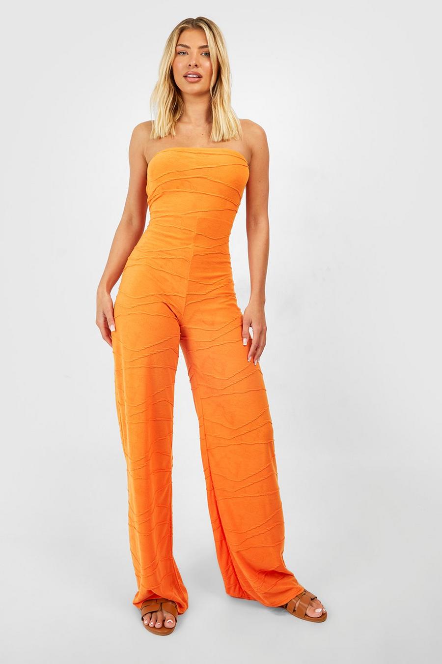 Orange Strapless Wide Leg Jumpsuit Met Textuur En Naaddetail image number 1