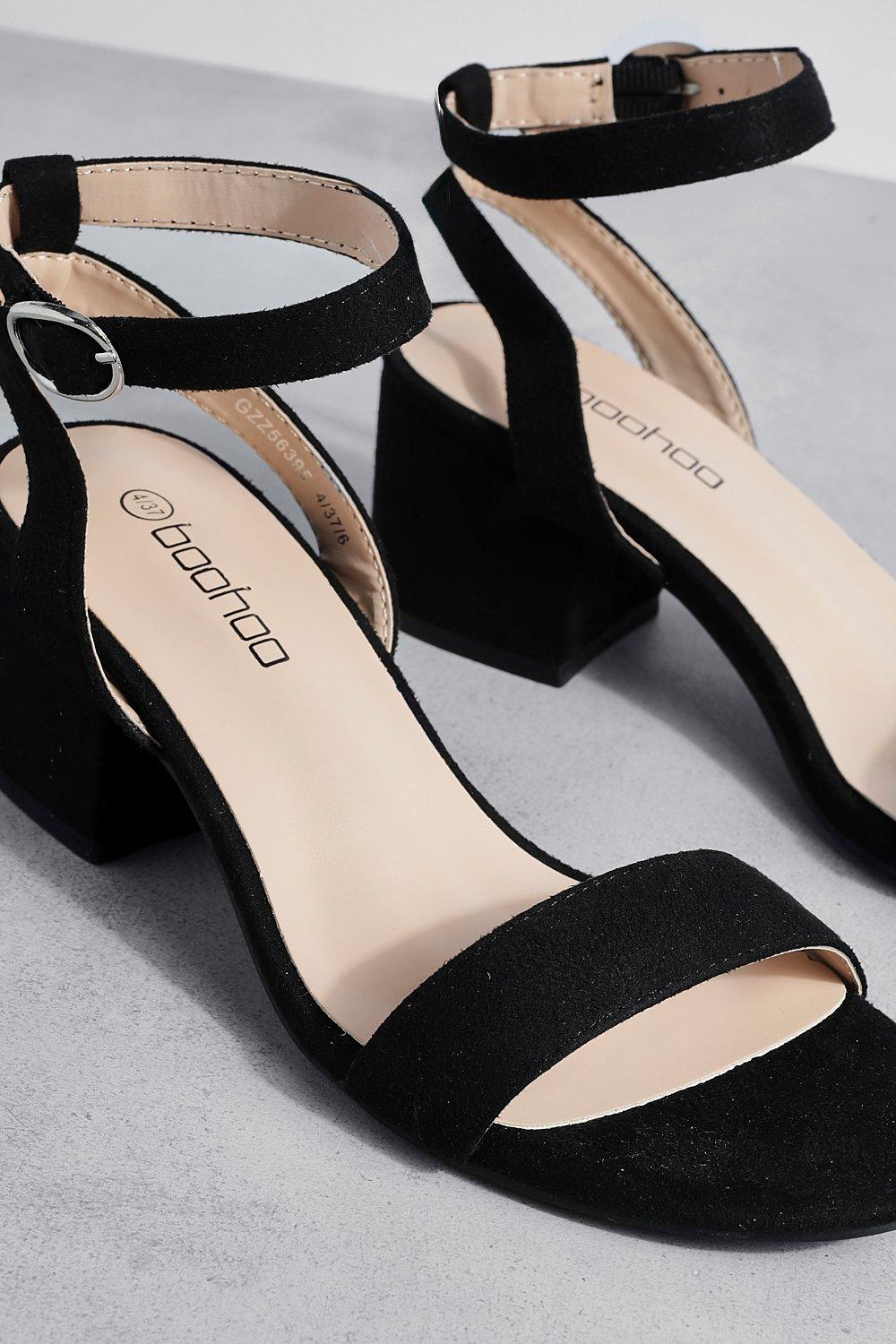 Black low block store heels