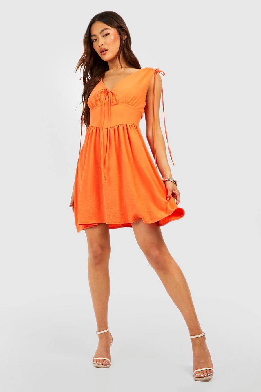 Orange Klänning med knytdetaljer image number 1