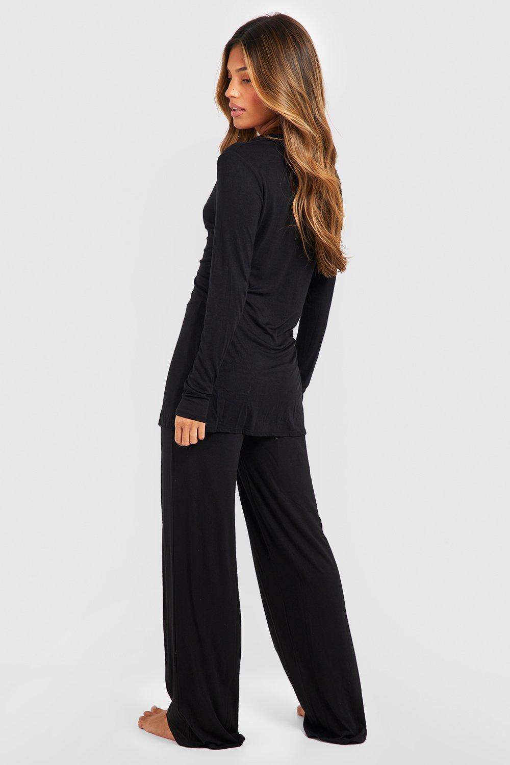 https://media.boohoo.com/i/boohoo/gzz60169_black_xl_1/female-black-jersey-knit-collar-button-up-lounge-set