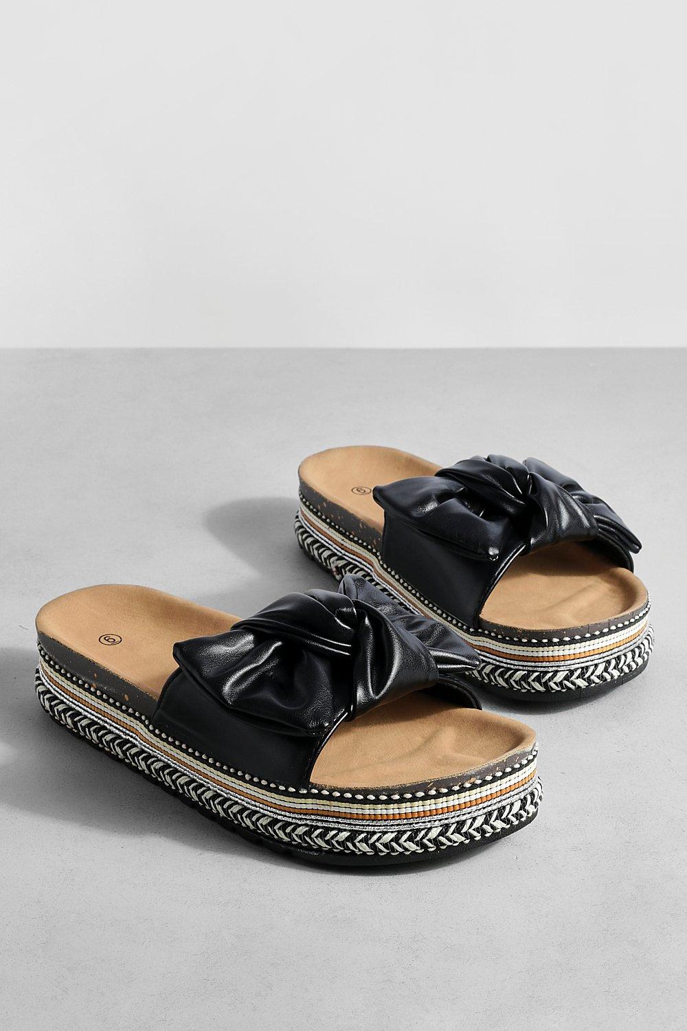 Black store bow flatforms