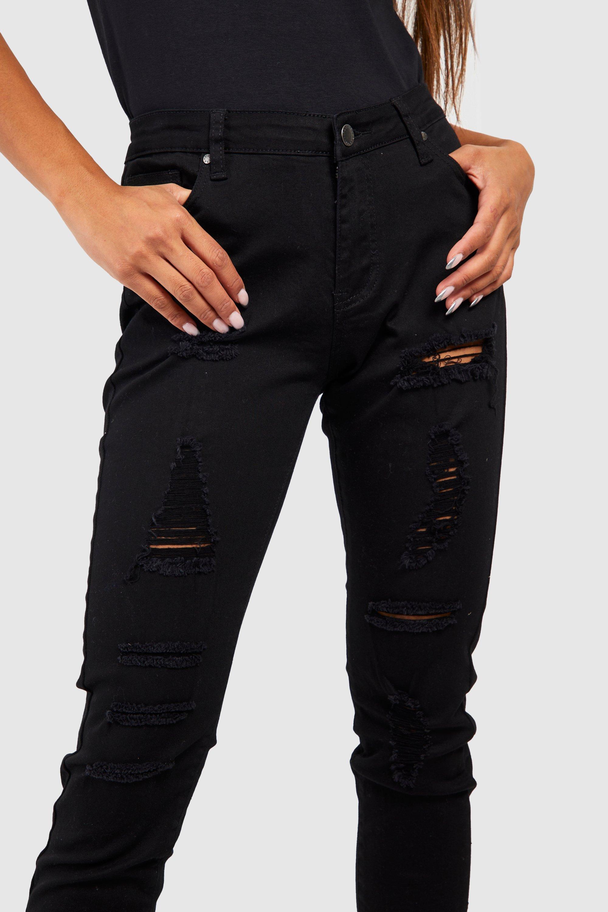 Jean slim outlet noir déchiré femme