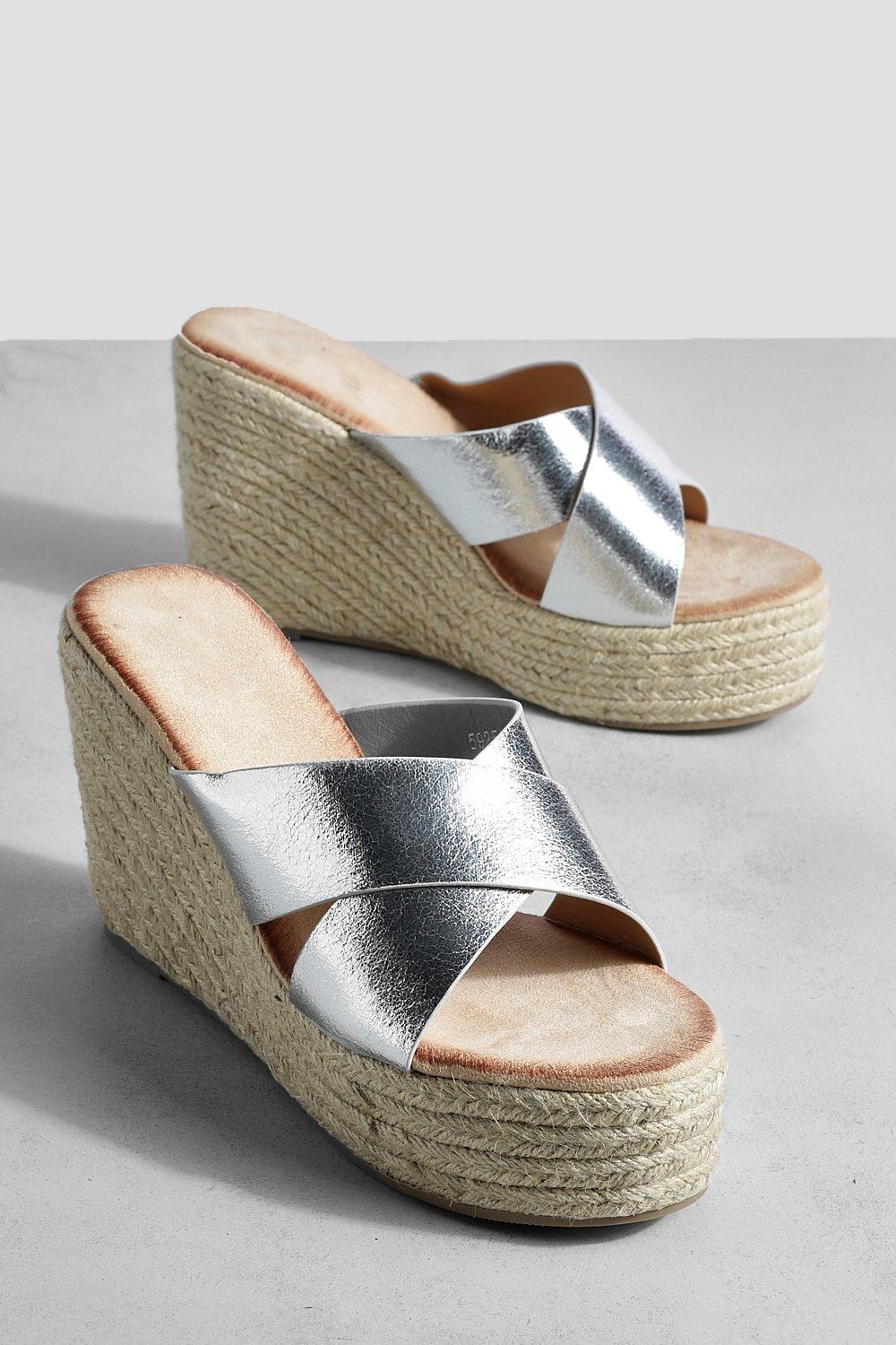 https://media.boohoo.com/i/boohoo/gzz62710_silver_xl_2/female-silver-cross-strap-wedges