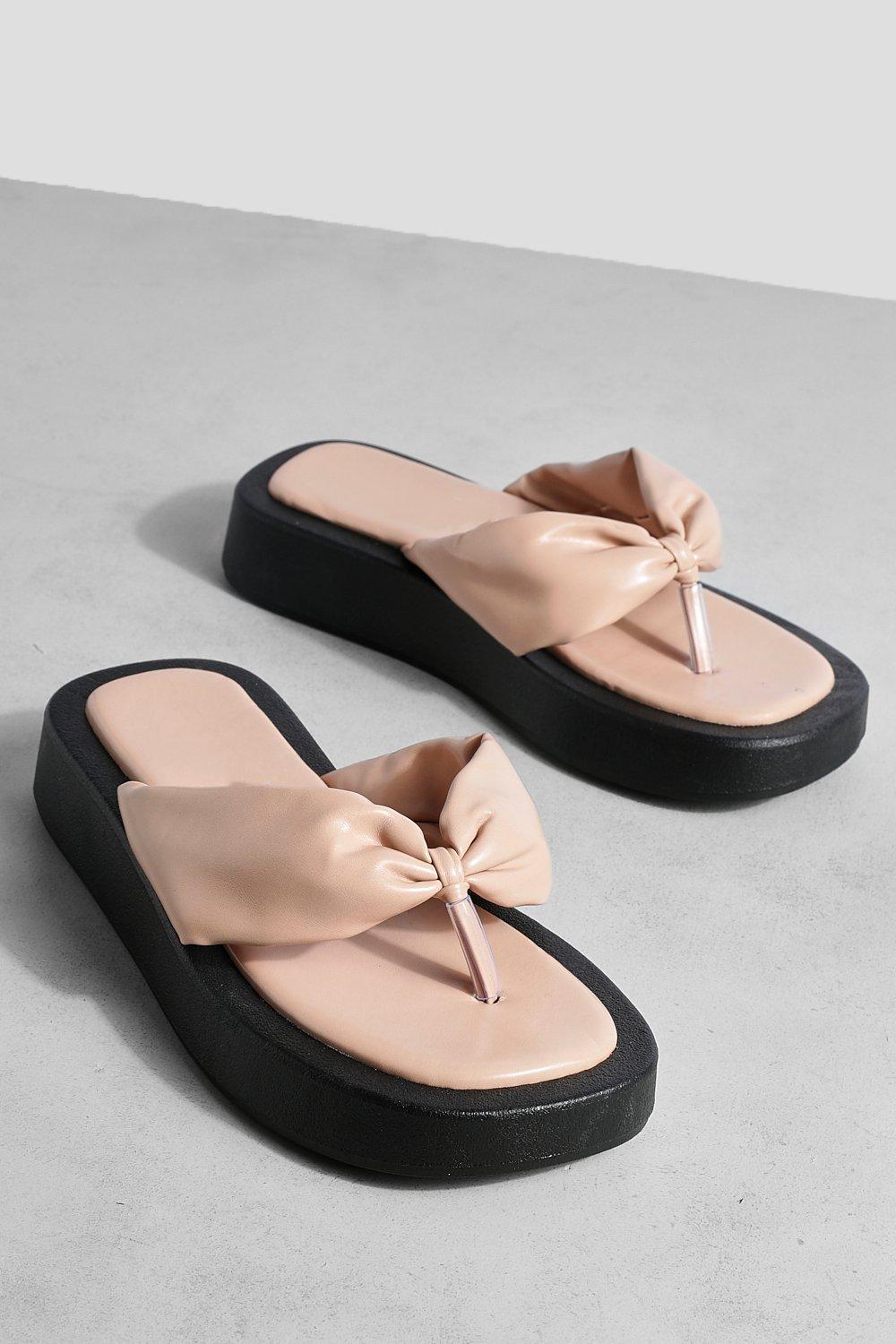 https://media.boohoo.com/i/boohoo/gzz62977_nude_xl_2/female-nude-wide-width-padded-toe-post-flip-flop