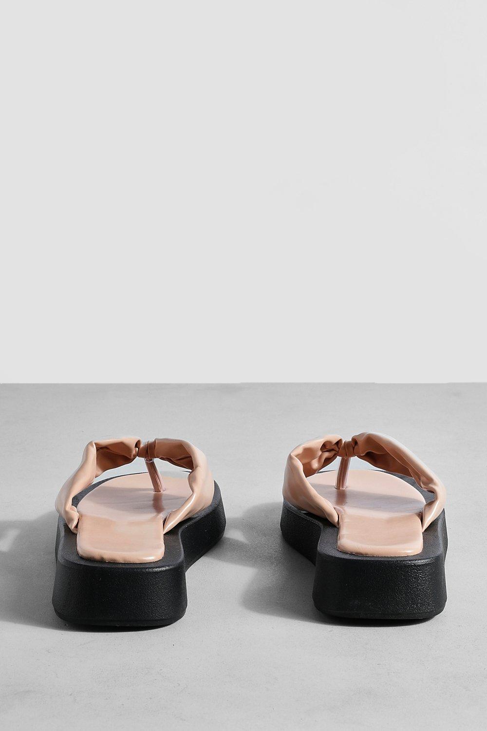 https://media.boohoo.com/i/boohoo/gzz62977_nude_xl_3/female-nude-wide-width-padded-toe-post-flip-flop