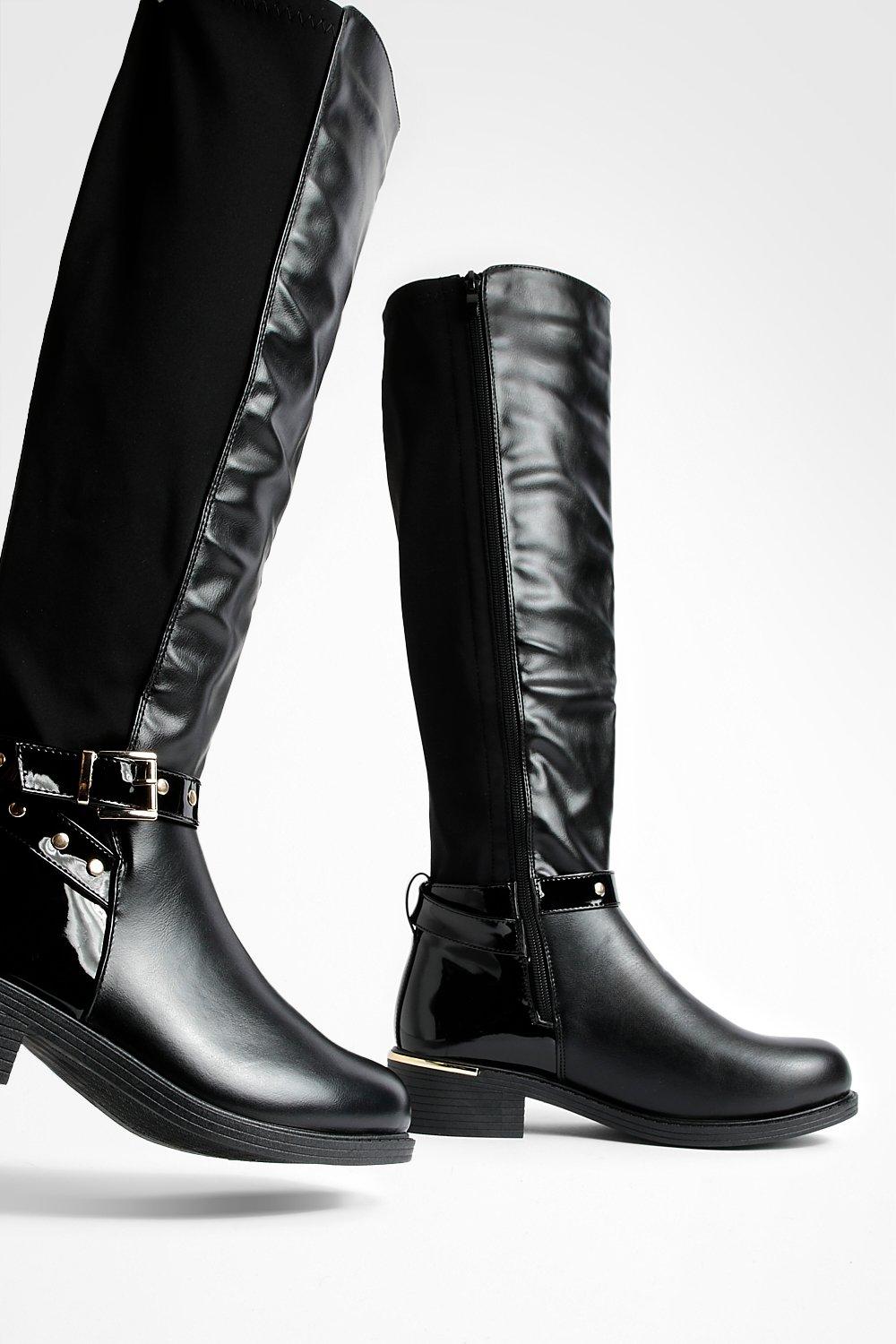 Stud And Buckle Detail Stretch Panel Knee High Boots boohoo UK