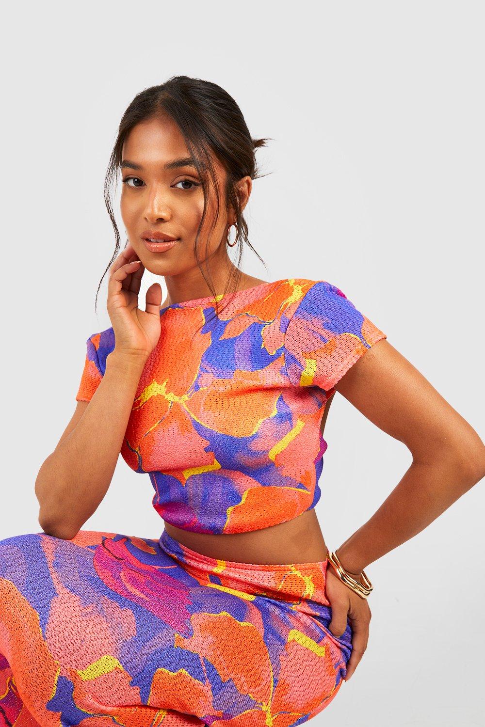 https://media.boohoo.com/i/boohoo/gzz64729_orange_xl_3/female-orange-petite-bold-floral-cap-sleeve-backless-top