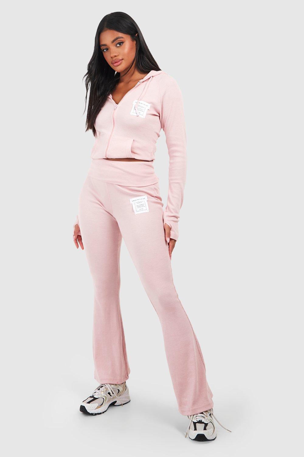 https://media.boohoo.com/i/boohoo/gzz66482_baby%20pink_xl_2/female-baby%20pink-dsgn-studio-ribbed-woven-label-flare-yoga-pants