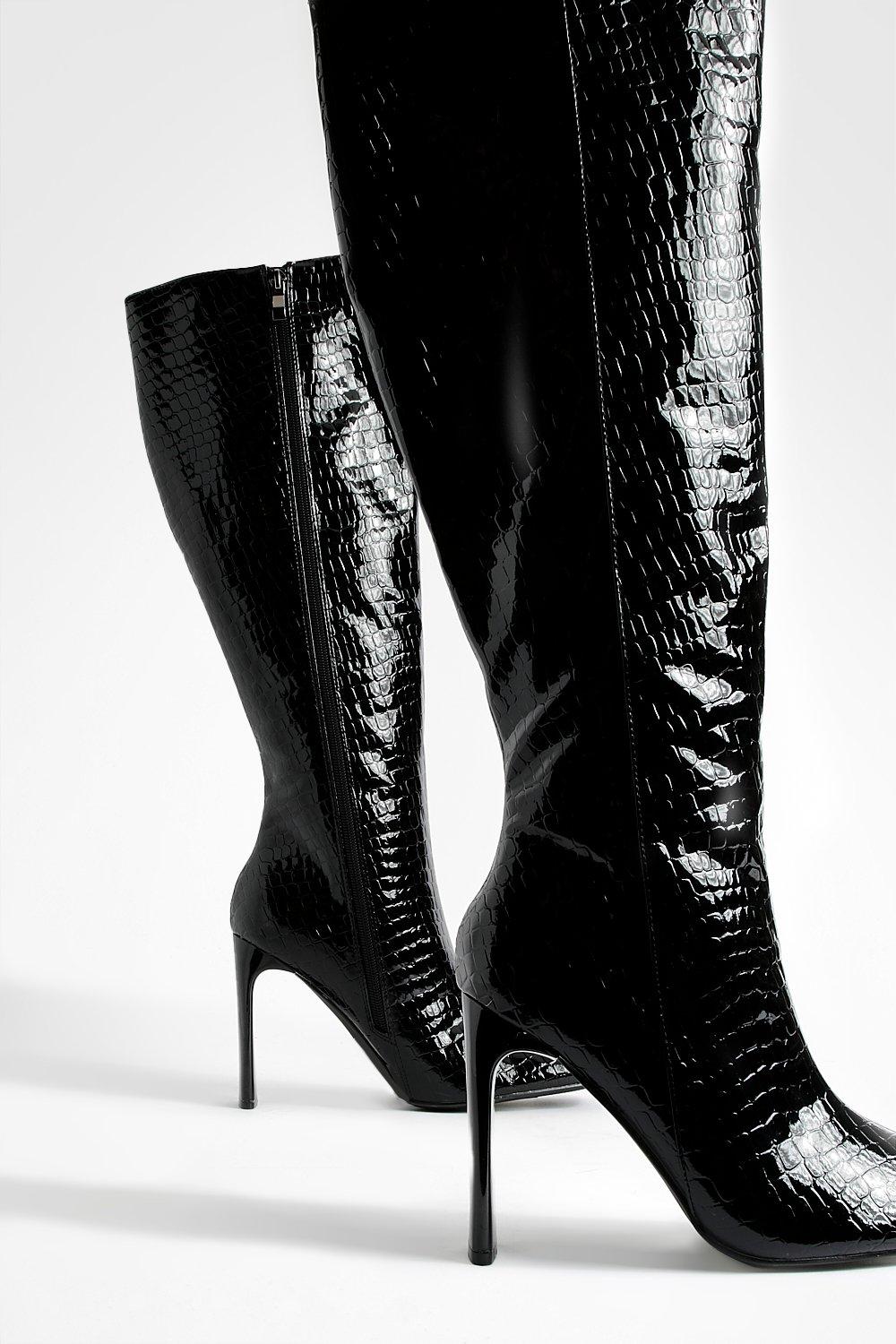 Flat heeled knee high clearance boots