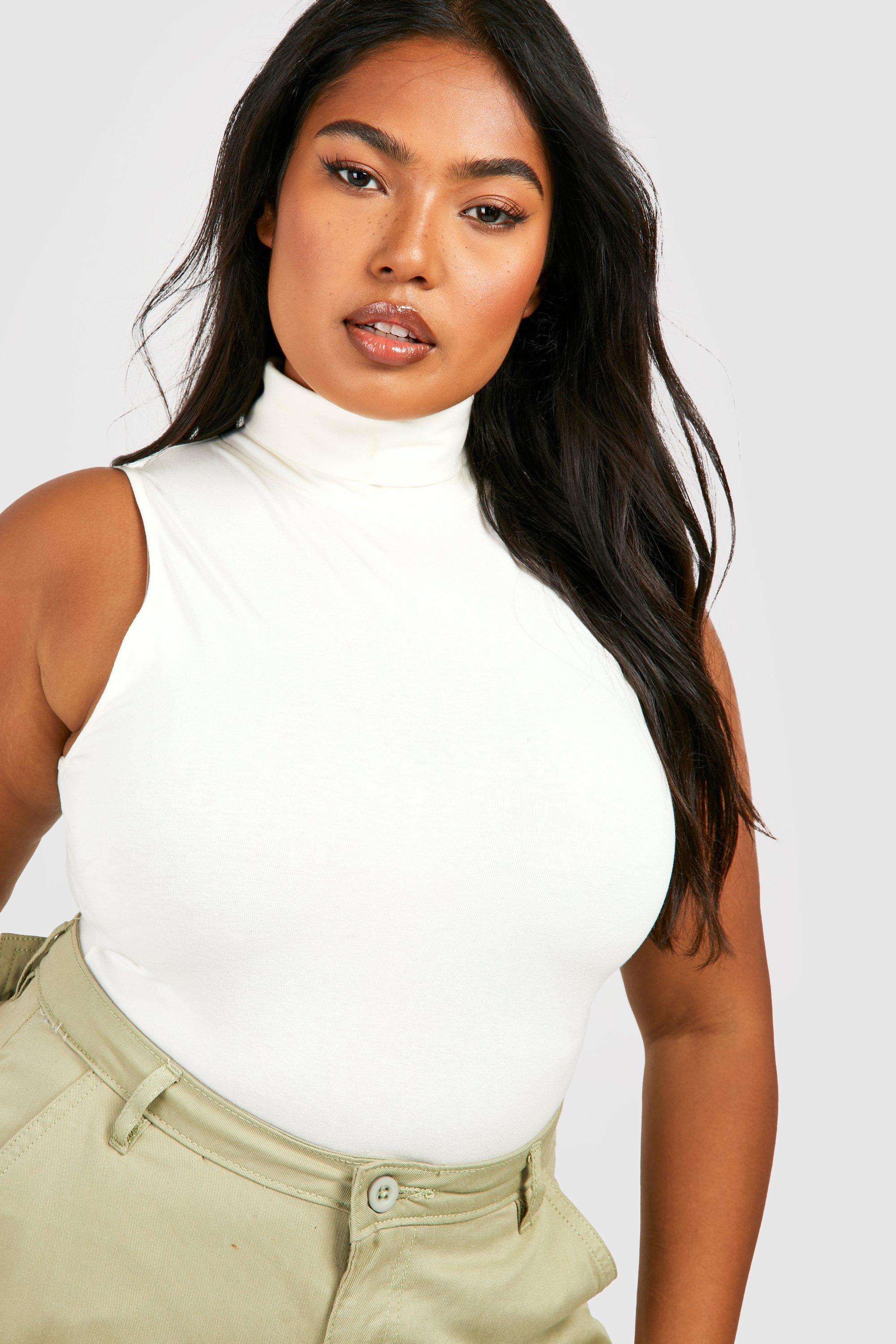 White sleeveless roll sales neck top