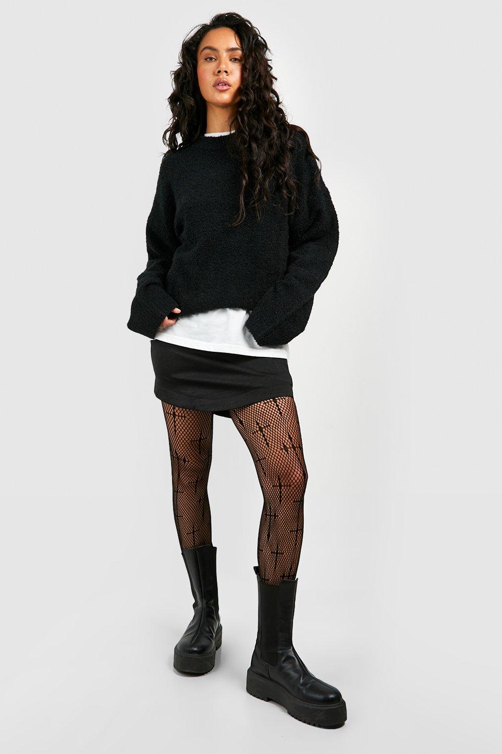 https://media.boohoo.com/i/boohoo/gzz68562_black_xl_1/female-black-cross-detailed-fishnet-tights--