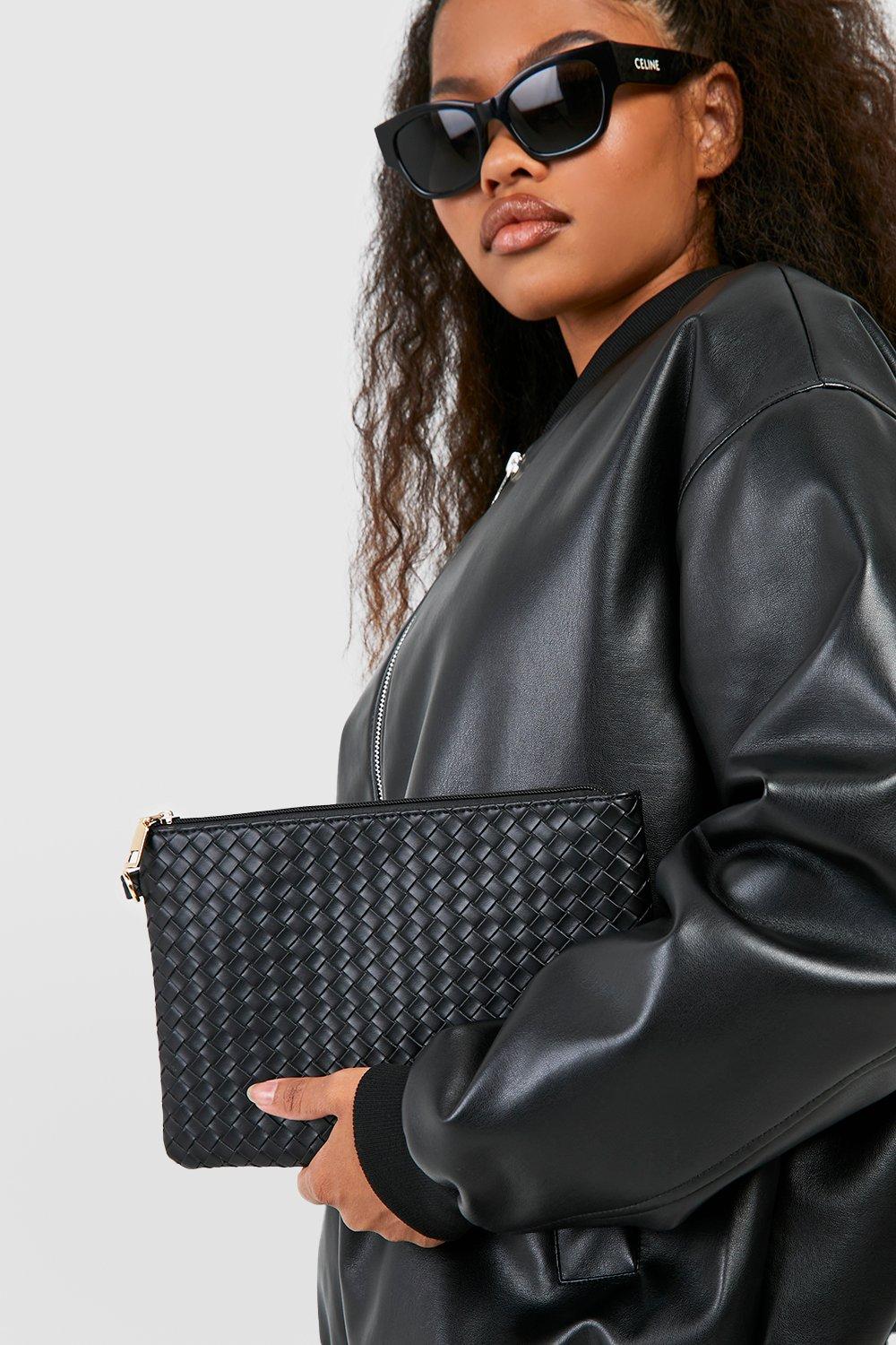 Black woven best sale clutch bag