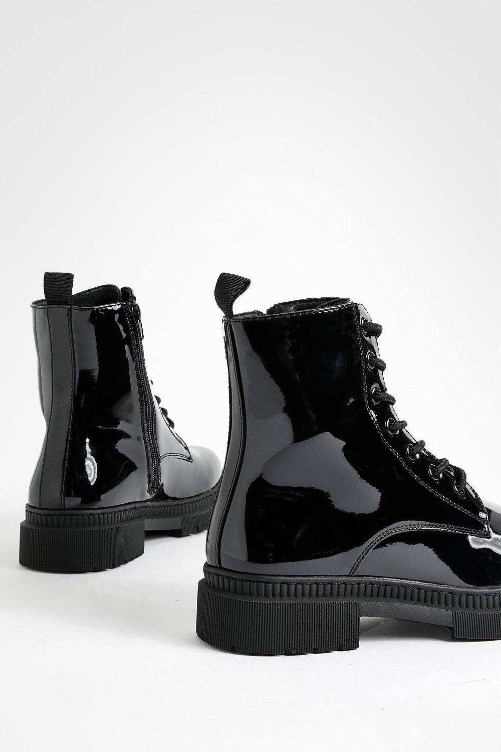 Shiny black store lace up boots