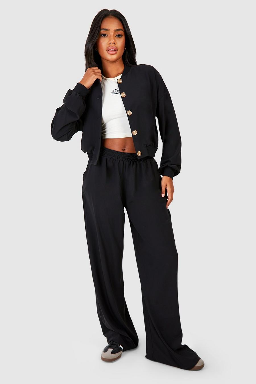 Pantalón de pernera ancha con cintura elástica, Black image number 1