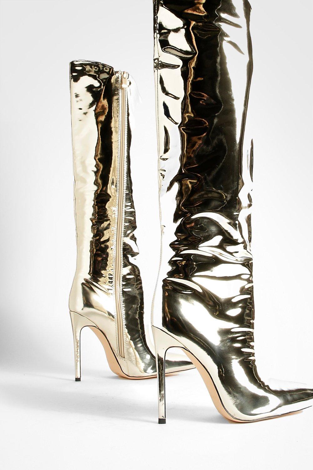 Metallic gold store thigh high boots