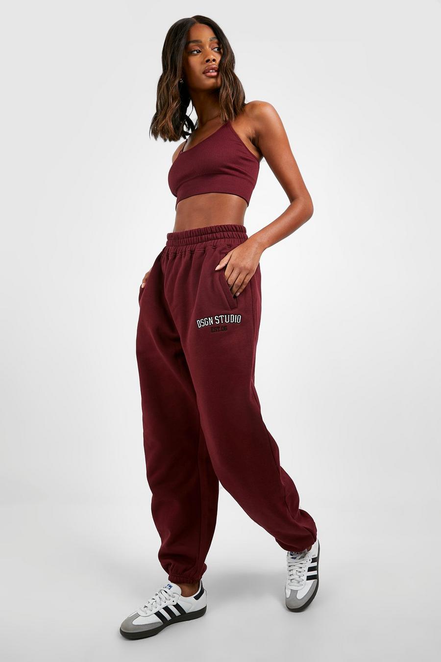 Burgundy Dsgn Studio Applique Oversized Cuffed Track Pants image number 1