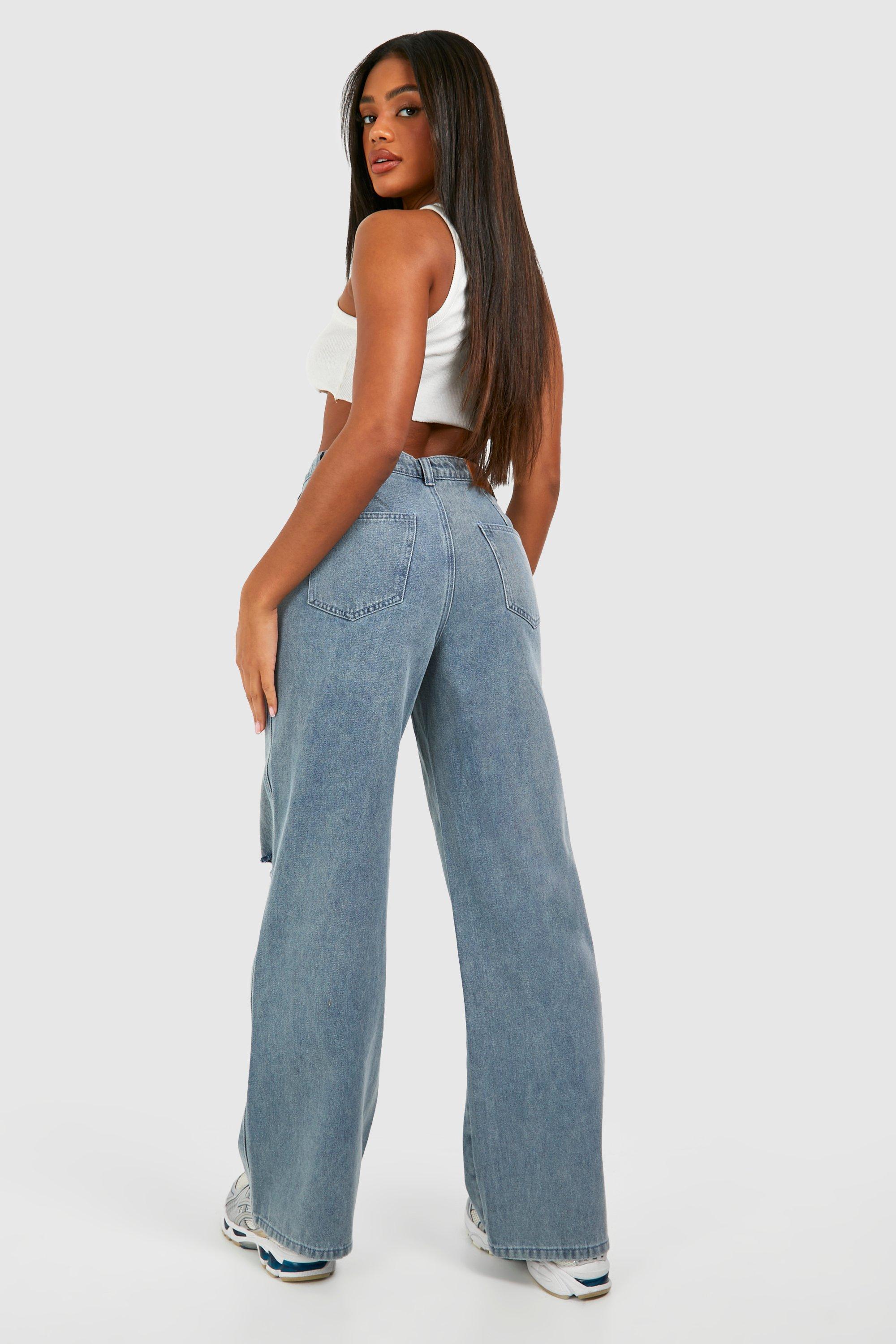 Jeans strappati con laccetti in vita e pieghe