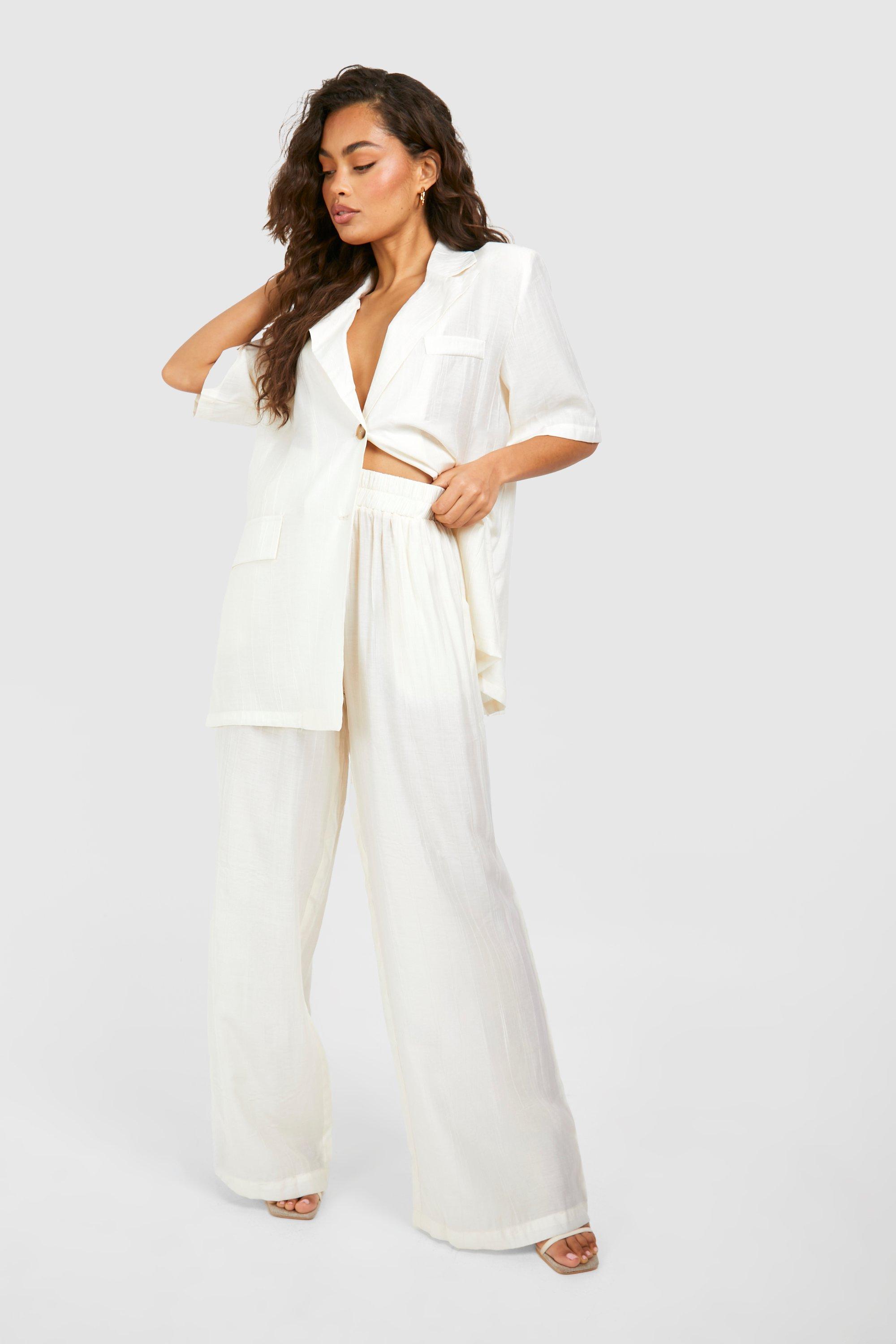 Textured Crinkle Relaxed Fit Wide Leg Trousers | boohoo IL