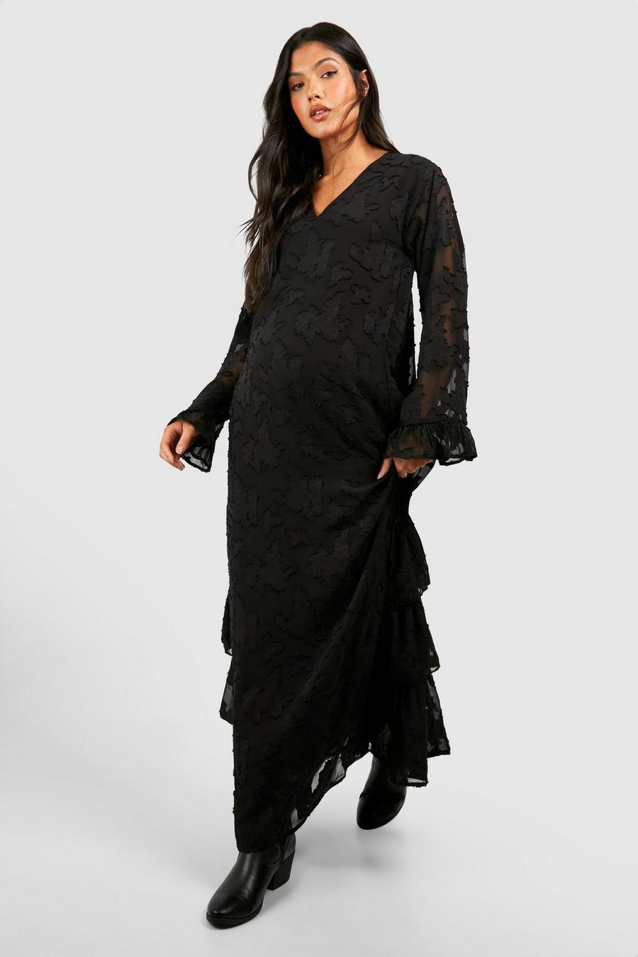Black Mammakläder Blommig långklänning med volanger image number 1
