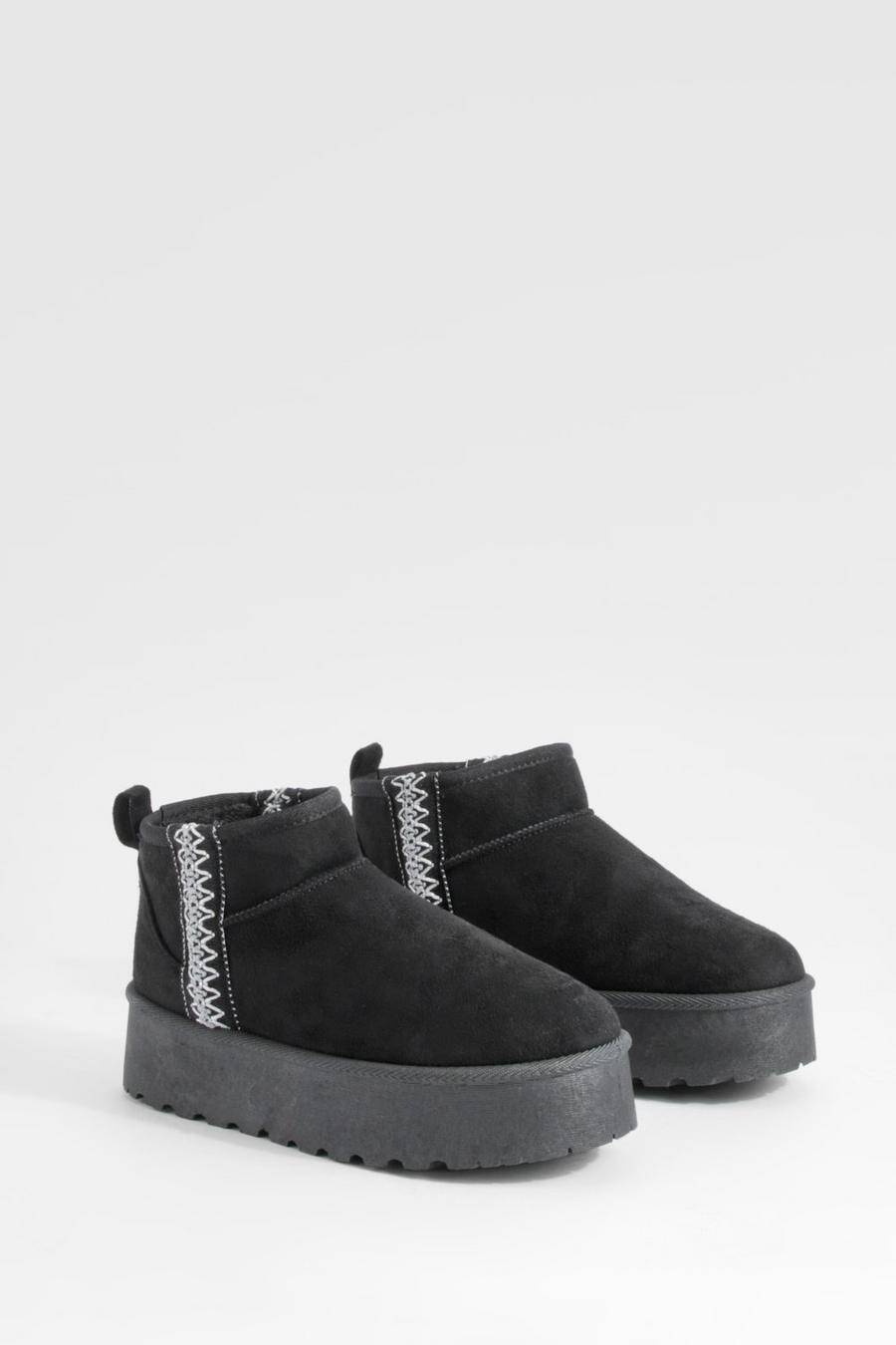 Black Små mjuka boots med platå och brodyr
