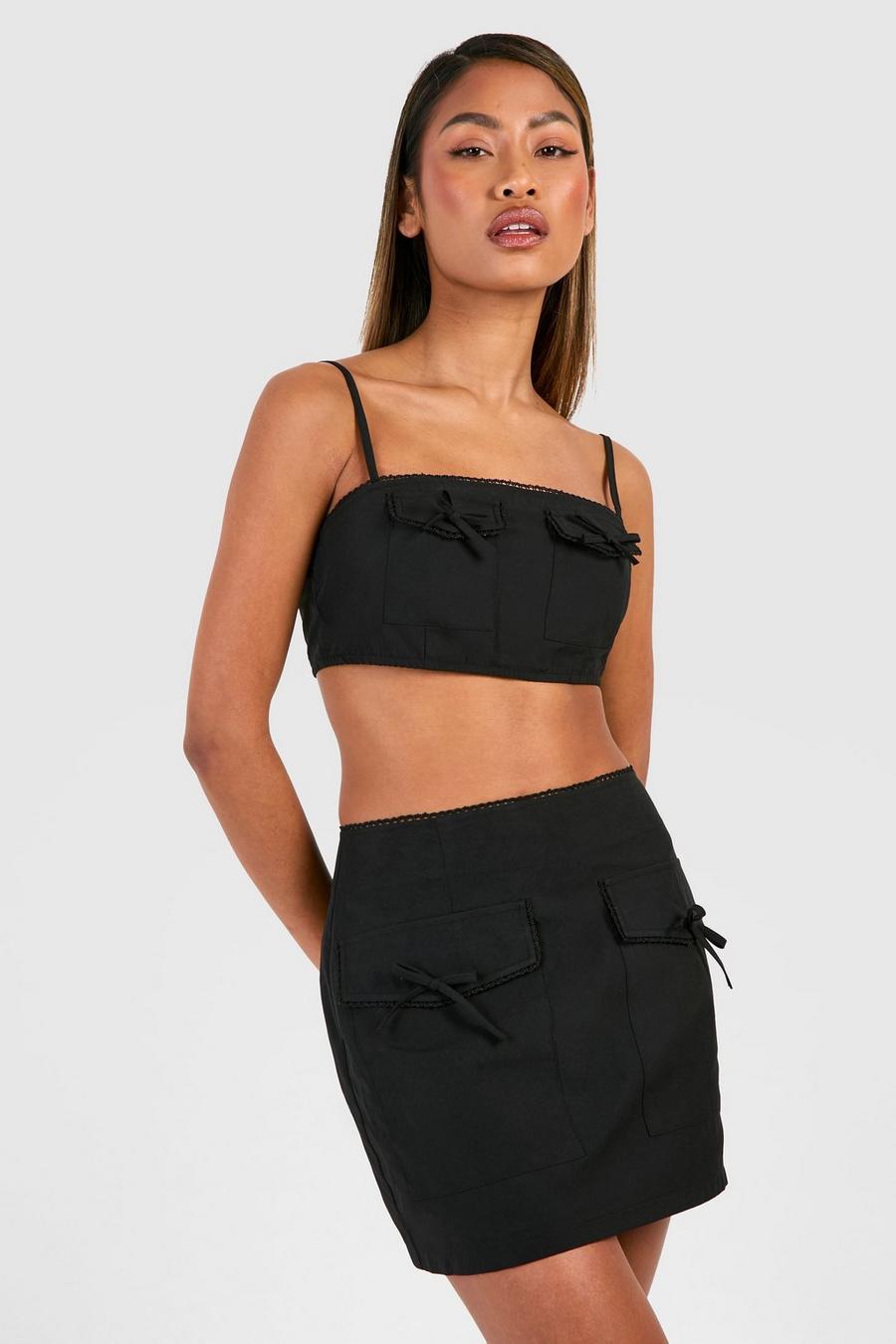 Minifalda con bolsillos y lazo, Black image number 1