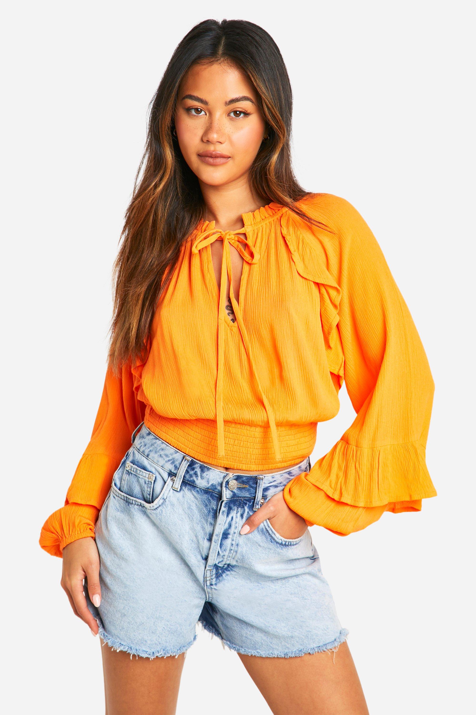 Orange ruffle sleeve top on sale