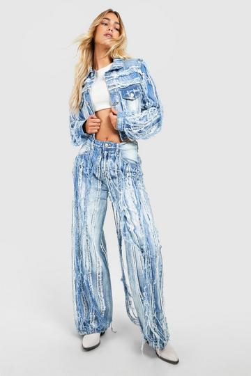 Extreme Distressed Washed Straight Leg Jean light wash