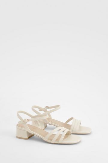 Ecru White Triple Strap Asymmetric Low Block Heels