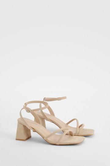 Double Strap Asymmetric Low Block Heel nude