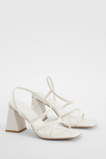 White Strappy Asymmetric Low Block Heels