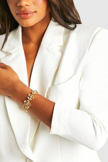 Statement Embellished Flower Bracelet gold