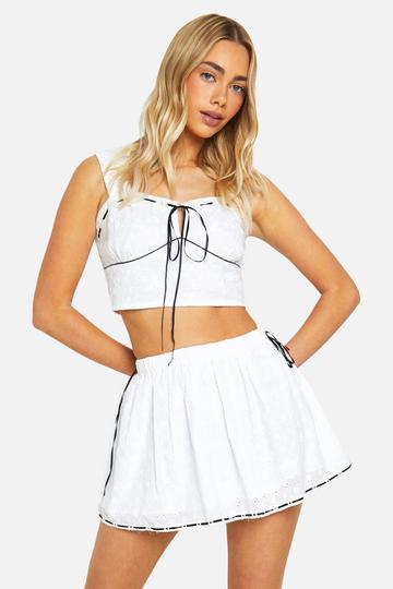 White Eyelet Contrast Bow Mini Skirt