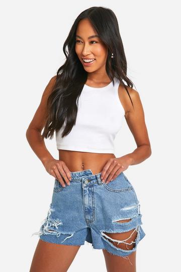 Extreme Distressed Asymmetric Waistband Jean Shorts light blue