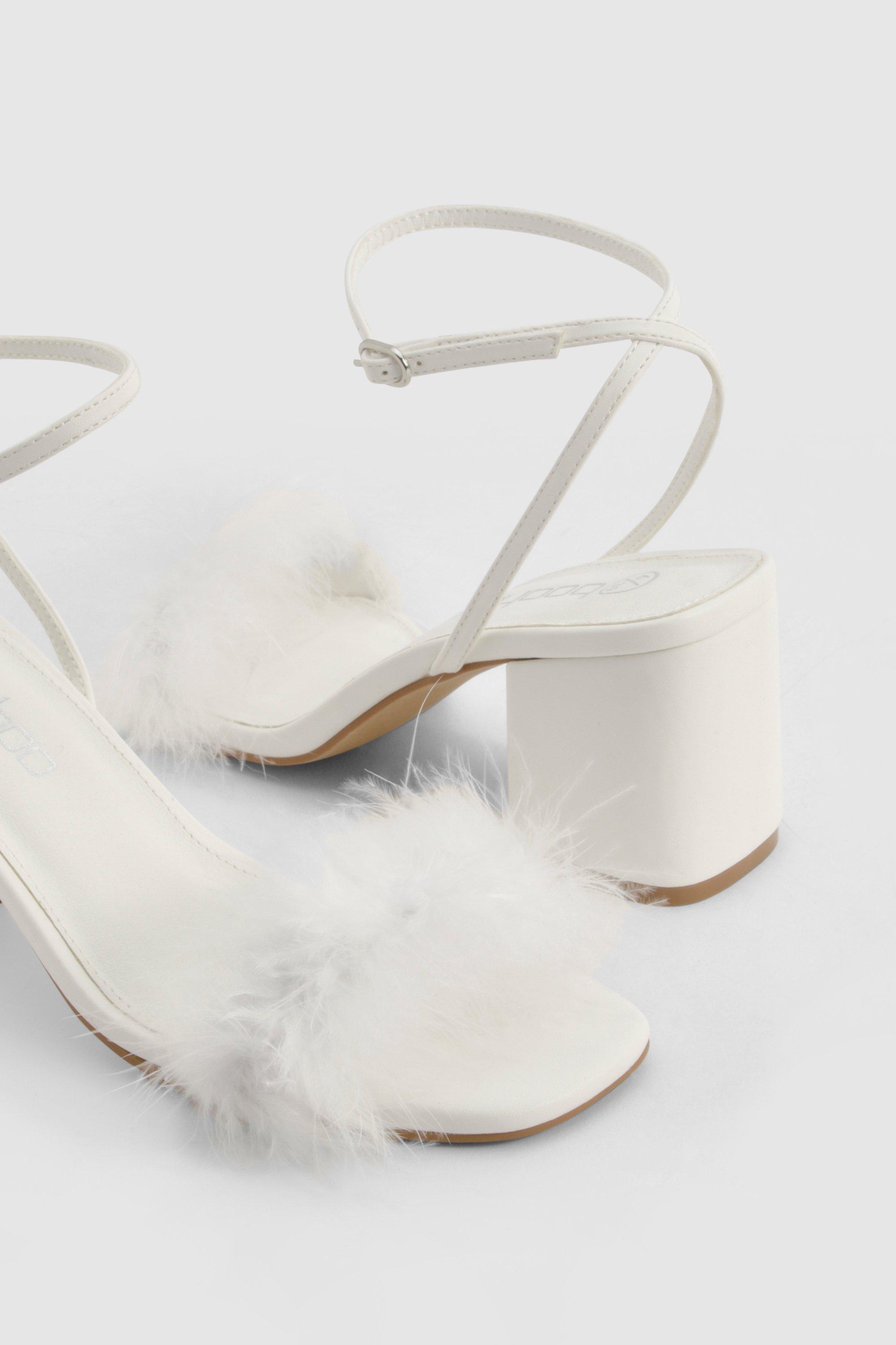 Low fluffy heels best sale