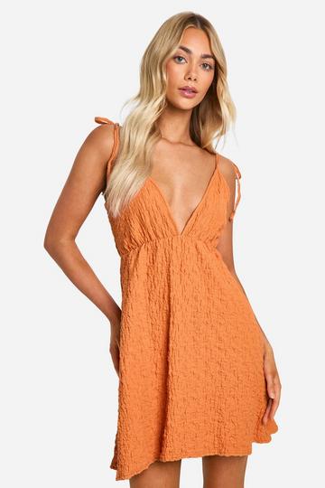 Orange Textured Cut Out Detail Skater Dress