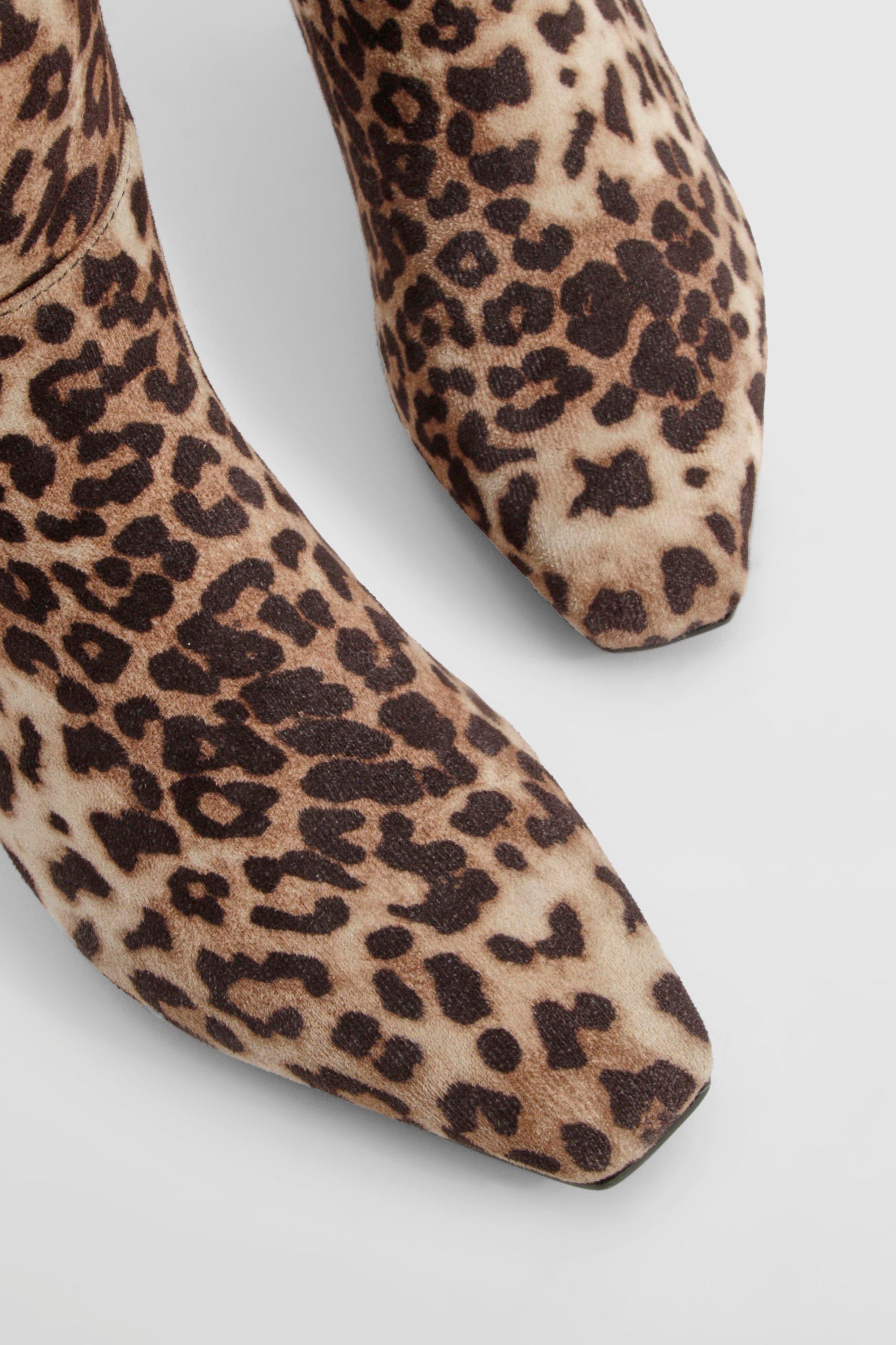 Animal print knee boots deals