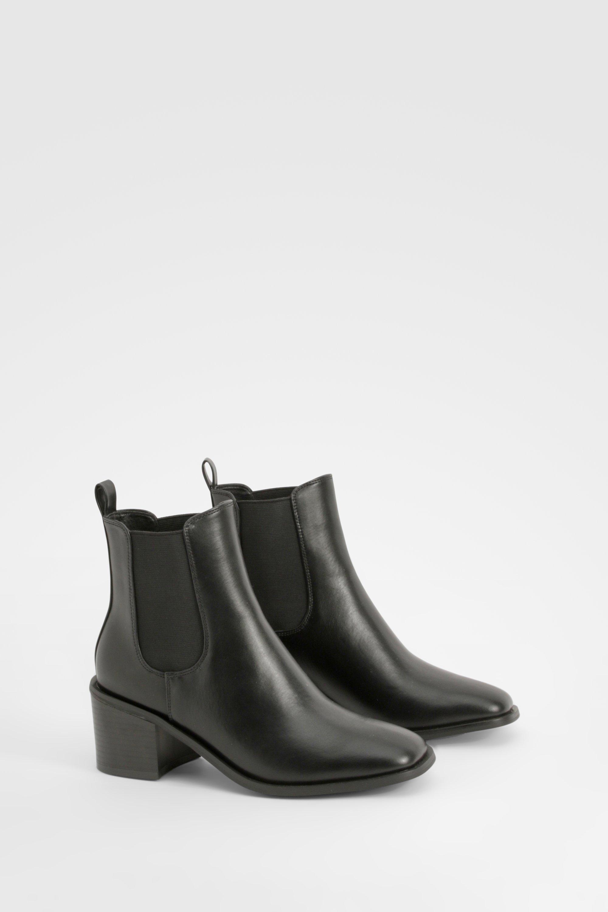 Black booties with wooden heel hotsell