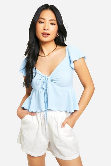 Petite Wafel Gebreide Peplum Top Met Franjes blue