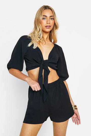 Platgeslagen Opgeknoopte Crop Top En Losse Shorts black