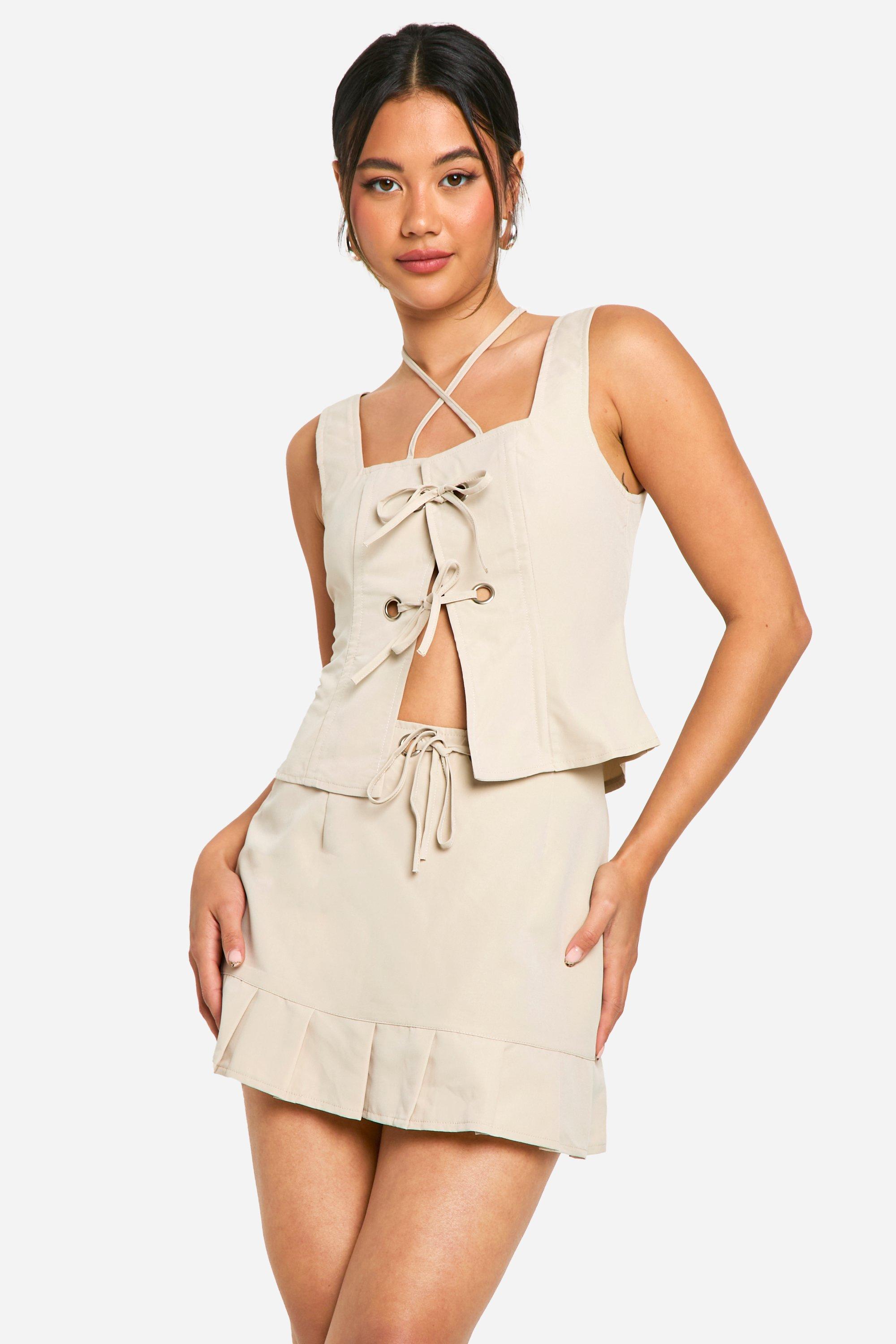 Stone Pleated Hem Mini Skirt