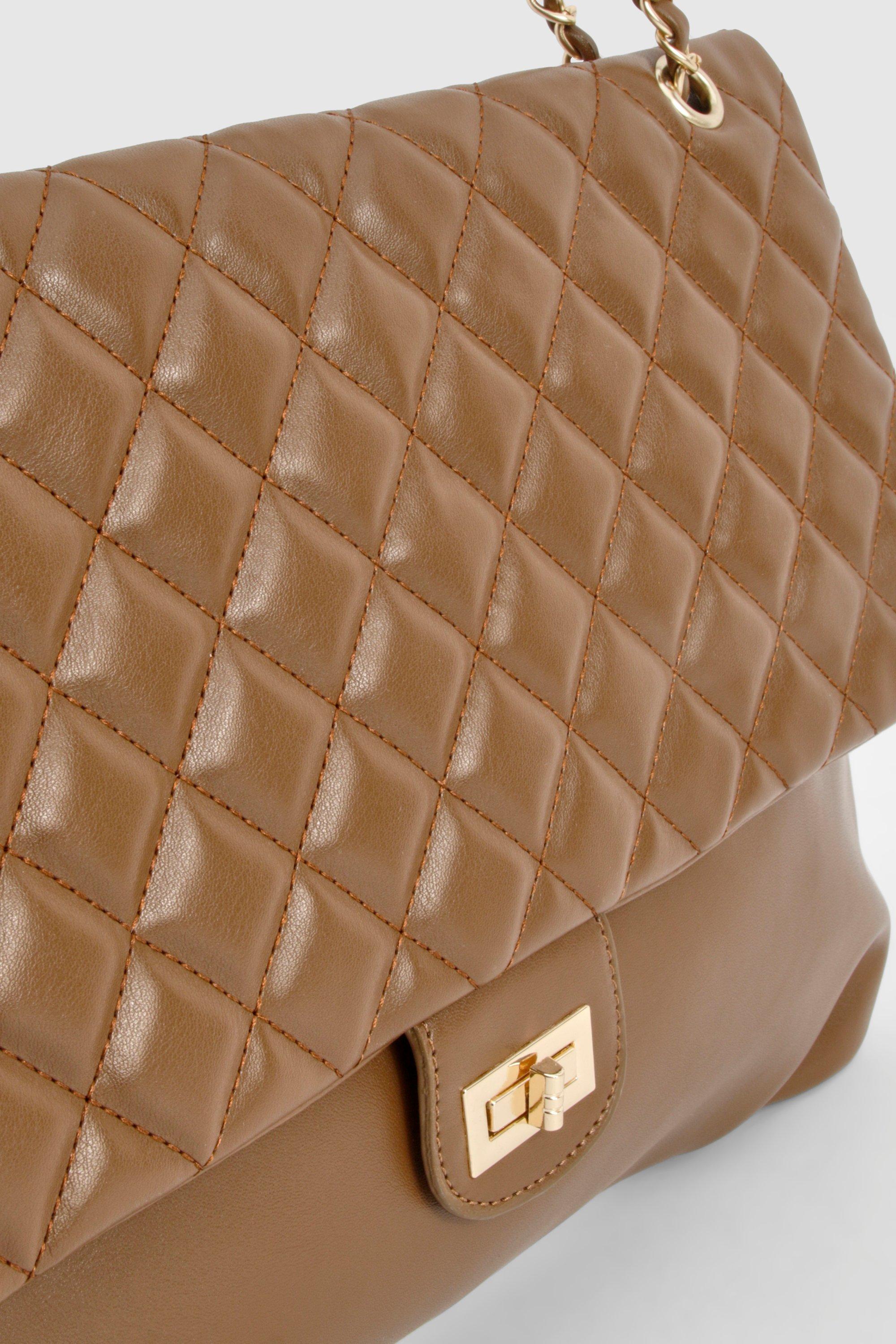 Quilted leather shoulder bag best sale